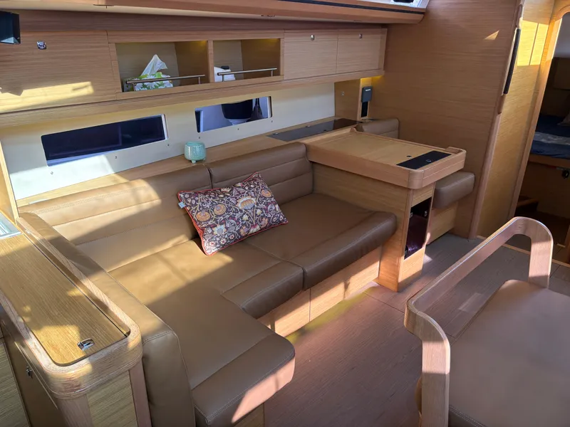 Slide: The Image of Luxurious interior of 2018 Dufour 560 Exclusive yacht with elegant leather seating. - 49