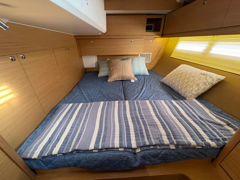 Slide: The Image of Cozy cabin interior of 2018 Dufour 560 Exclusive yacht with comfortable bedding. - 51
