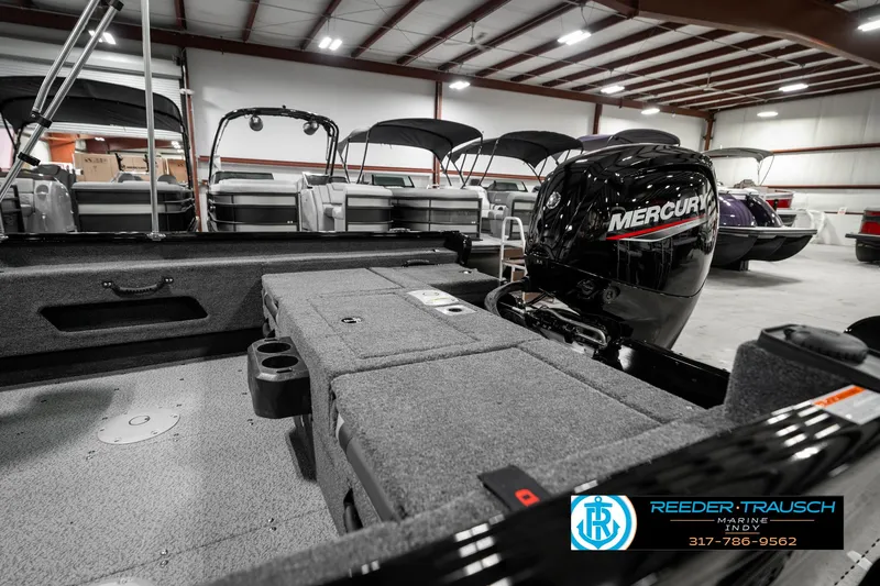 Slide: The Image of 2025 Lund 1775 Adventure Sport boat with Mercury engine in showroom. - 24