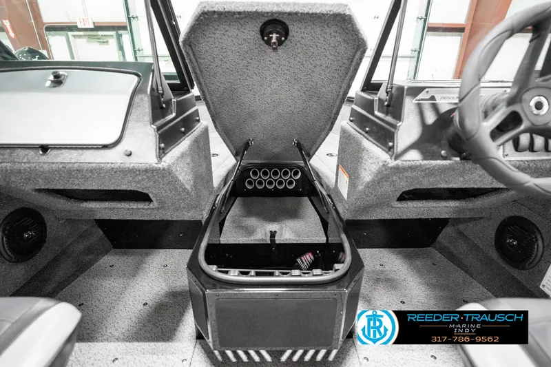 Slide: The Image of 2025 Lund 1775 Adventure Sport boat interior with open storage compartment. - 30