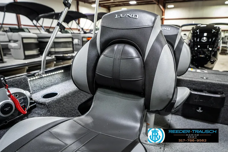 Slide: The Image of 2025 Lund 1775 Adventure Sport boat interior with sleek seating and modern design. - 41