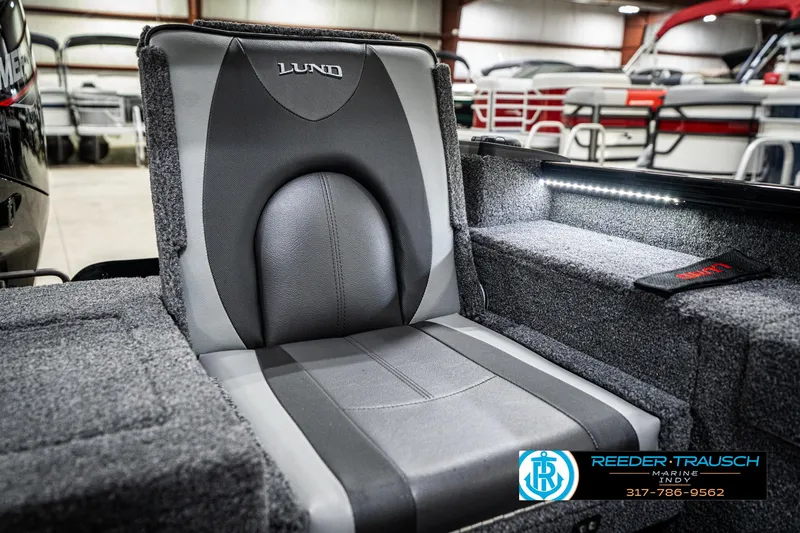Slide: The Image of 2025 Lund 1775 Adventure Sport boat seat, gray upholstery, indoor showroom setting. - 43