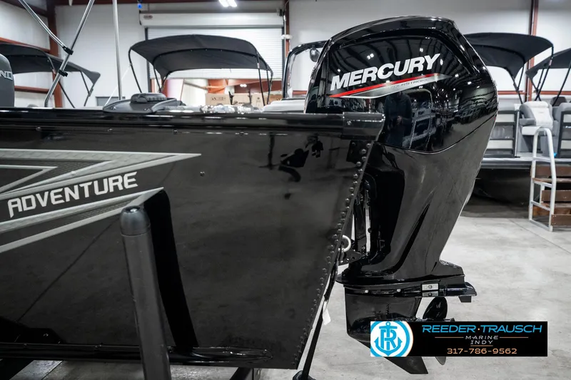 Slide: The Image of 2025 Lund 1775 Adventure Sport boat with Mercury engine in showroom. - 49