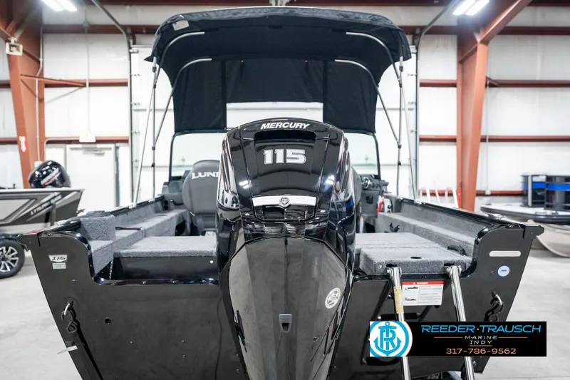 Slide: The Image of 2025 Lund 1775 Adventure Sport boat with Mercury 115 engine in showroom. - 8