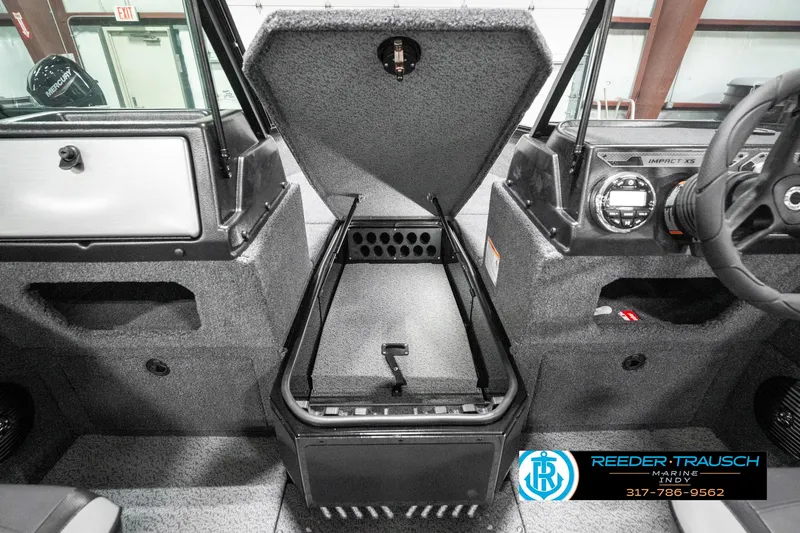 Slide: The Image of 2025 Lund 1875 Impact XS boat interior with open storage compartment. - 32