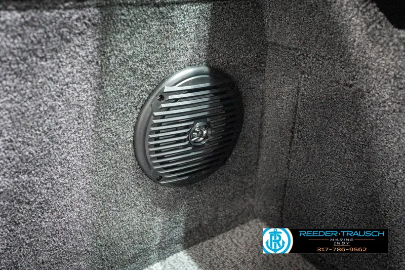 Slide: The Image of 2025 Lund 1875 Impact XS boat interior with speaker detail. - 49