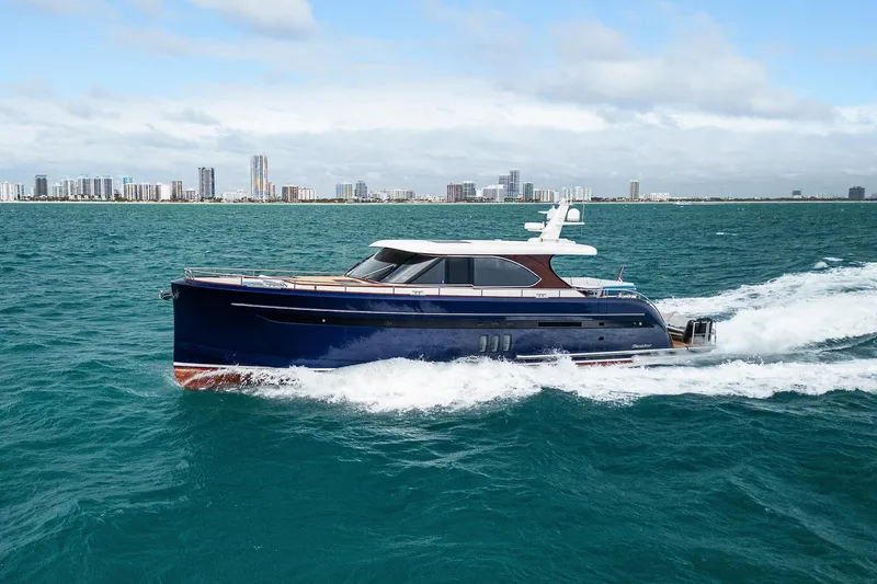 Slide: The Image of Luxury Steeler 60 S Performance yacht cruising on open water, 2021 model. - 11