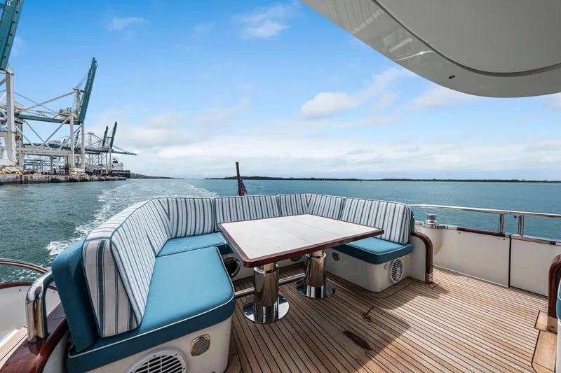 Slide: The Image of Luxurious 2021 Steeler 60 S Performance yacht deck with seating and ocean view. - 15