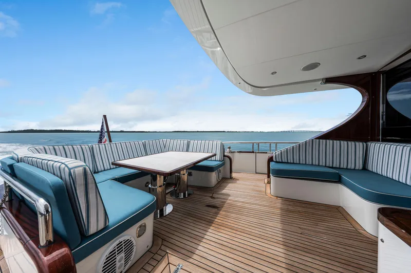 Slide: The Image of Luxury yacht deck with seating, Steeler 60 S Performance 2021, ocean view, blue sky. - 16
