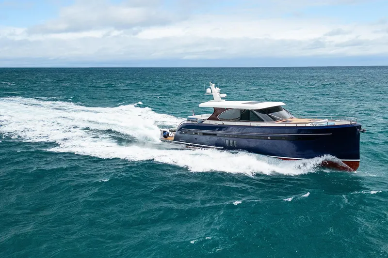 Slide: The Image of 2021 Steeler 60 S Performance yacht cruising on open sea. - 2