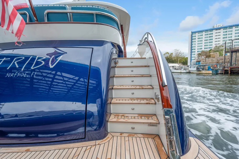 Slide: The Image of Luxury Steeler 60 S Performance yacht, 2021 model, with elegant wooden steps and sleek design. - 35