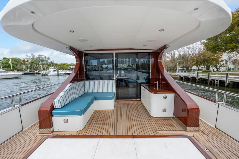 Slide: The Image of Luxurious 2021 Steeler 60 S Performance yacht deck with seating and waterfront view. - 36