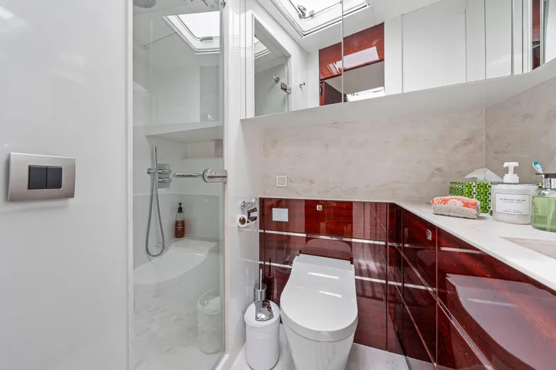 Slide: The Image of Luxurious bathroom in 2021 Steeler 60 S Performance yacht, featuring modern fixtures and elegant design. - 44