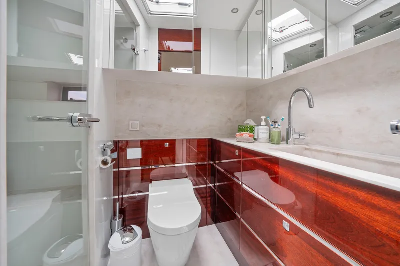 Slide: The Image of Luxurious bathroom in 2021 Steeler 60 S Performance yacht with modern fixtures and sleek design. - 45