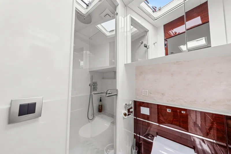 Slide: The Image of Luxurious bathroom in 2021 Steeler 60 S Performance yacht, featuring modern fixtures and elegant design. - 46