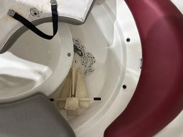 Slide: The Image of 2002 Sea-Doo Sport Boats 180 Challenger interior with anchor and chain storage. - 10