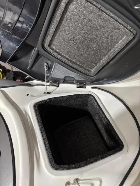 Slide: The Image of Open storage compartment of 2002 Sea-Doo Sport Boats 180 Challenger. - 14