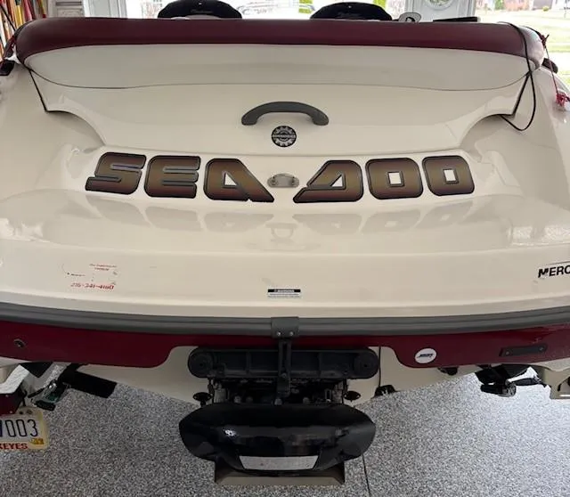 Slide: The Image of 2002 Sea-Doo Sport Boats 180 Challenger rear view in a garage setting. - 4