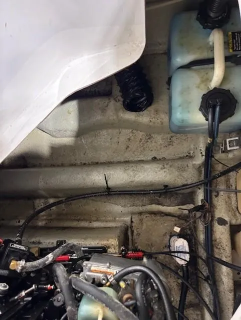 Slide: The Image of Engine compartment of a 2002 Sea-Doo Sport Boats 180 Challenger, showing wiring and components. - 7