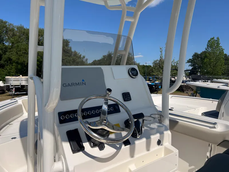 Slide: The Image of 2025 Key West 219 FS boat console with Garmin navigation system. - 5