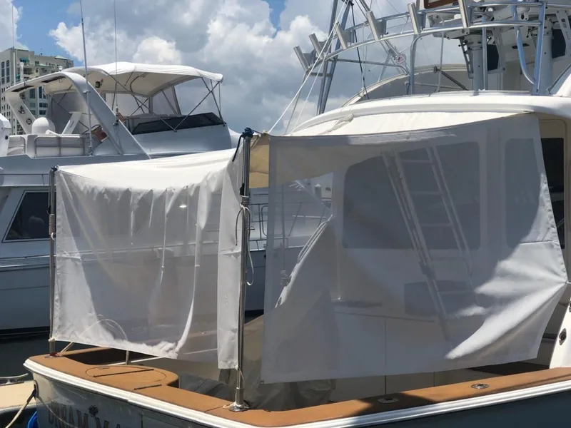 Slide: The Image of 2005 Ocean Yachts 50 Super Sport with covered deck at marina. - 13