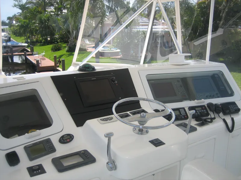 Slide: The Image of Helm of 2005 Ocean Yachts 50 Super Sport with navigation equipment and controls. - 2