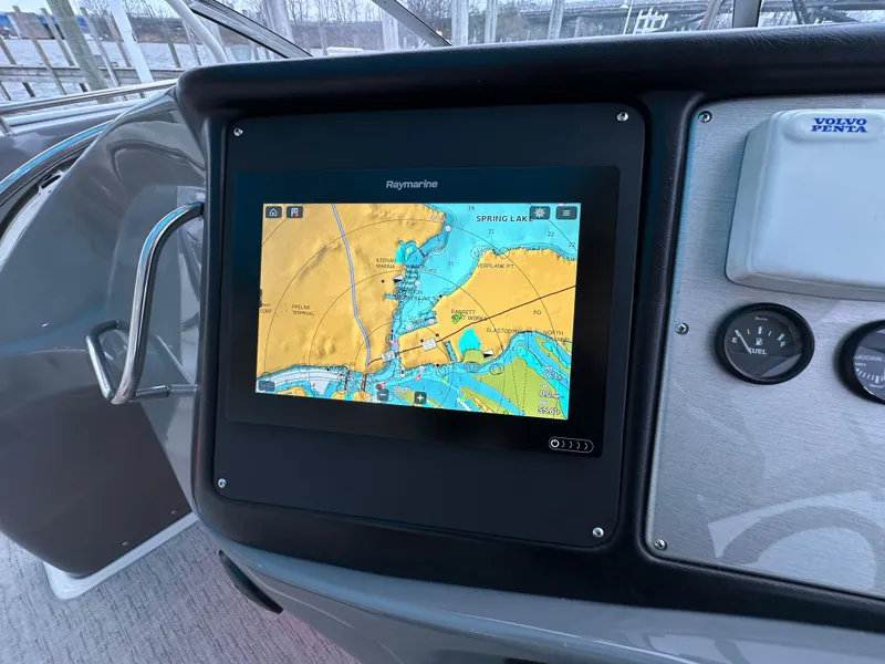 Slide: The Image of Helm of 2005 Cruisers Yachts 540 Express with Raymarine navigation display. - 15