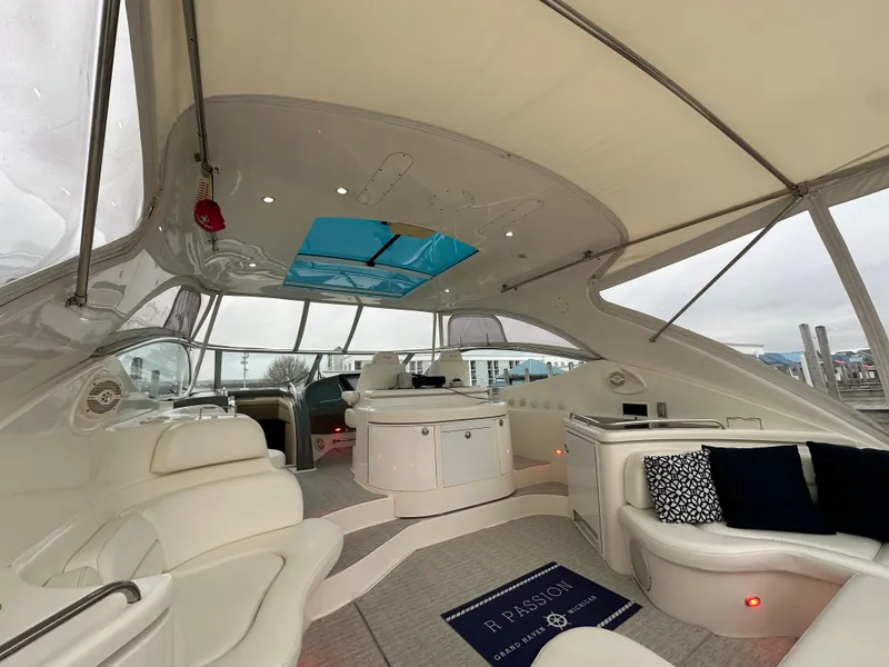 Slide: The Image of Luxurious interior of 2005 Cruisers Yachts 540 Express with elegant seating and modern design. - 2
