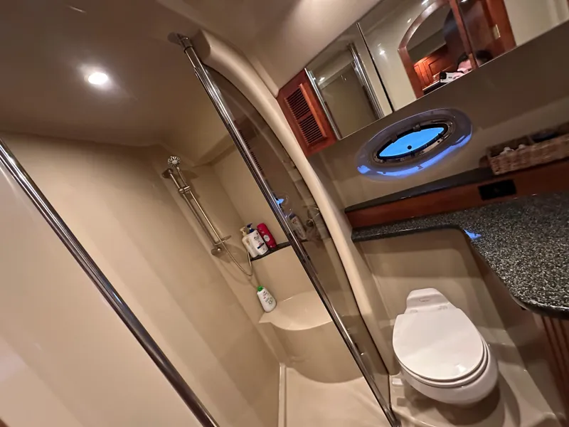 Slide: The Image of Luxurious bathroom in 2005 Cruisers Yachts 540 Express with shower and modern amenities. - 33