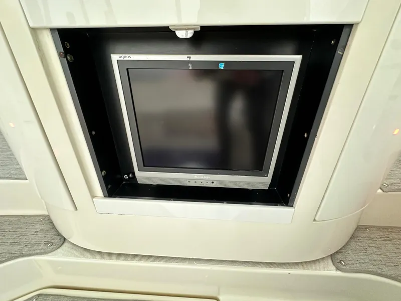 Slide: The Image of Built-in TV screen on 2005 Cruisers Yachts 540 Express. - 9