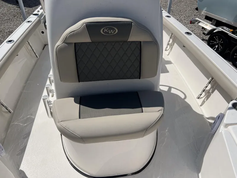 Slide: The Image of 2025 Key West 210 Bay Reef boat seat with gray cushioning and diamond pattern. - 14
