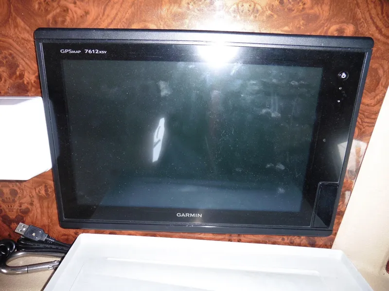 Slide: The Image of Garmin GPSmap 7612xsv on 2005 Meridian PILOTHOUSE boat, mounted on wood panel. - 29