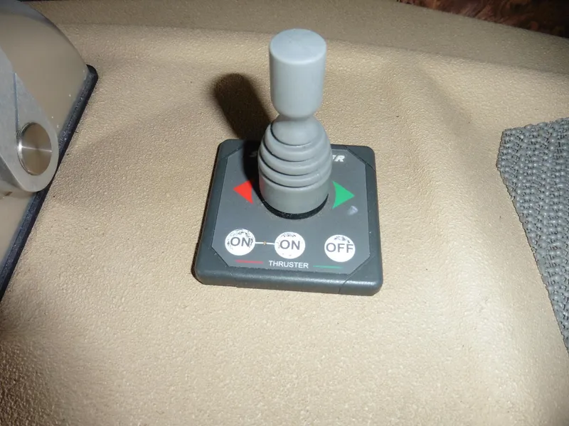Slide: The Image of Joystick control panel on 2005 Meridian PILOTHOUSE boat, featuring thruster controls. - 30