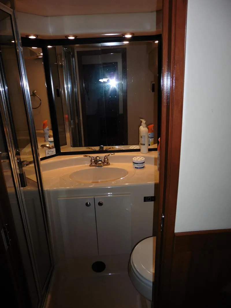 Slide: The Image of 2005 Meridian PILOTHOUSE bathroom with sink, mirror, and shower. - 33
