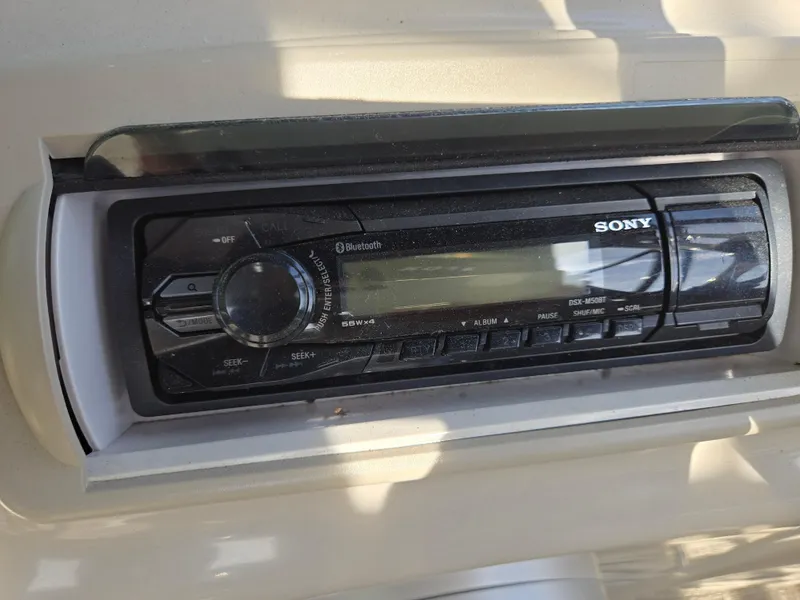 Slide: The Image of Sony stereo system in a 2015 Bennington 24 SSRX30 boat dashboard. - 22