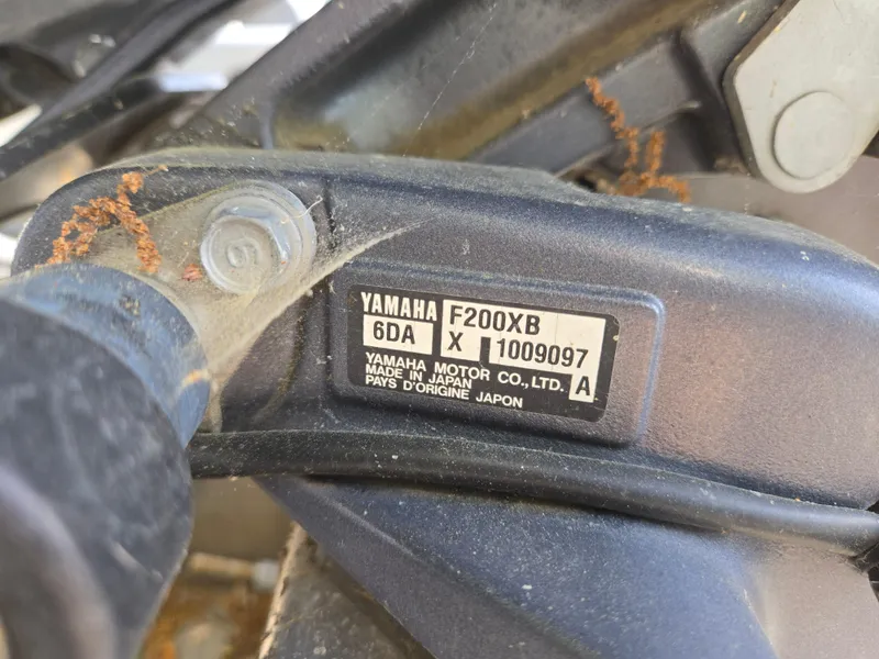 Slide: The Image of Yamaha F200X8 engine label on a 2015 Bennington 24 SSRX30 boat. - 43