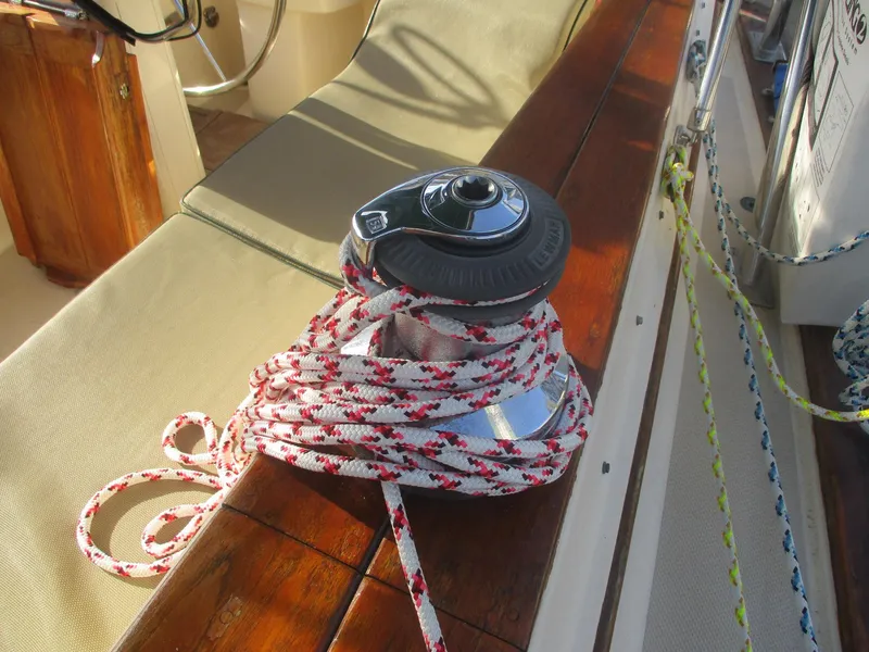 Slide: The Image of Winch with rope on 1999 Island Packet 380 sailboat deck. - 15