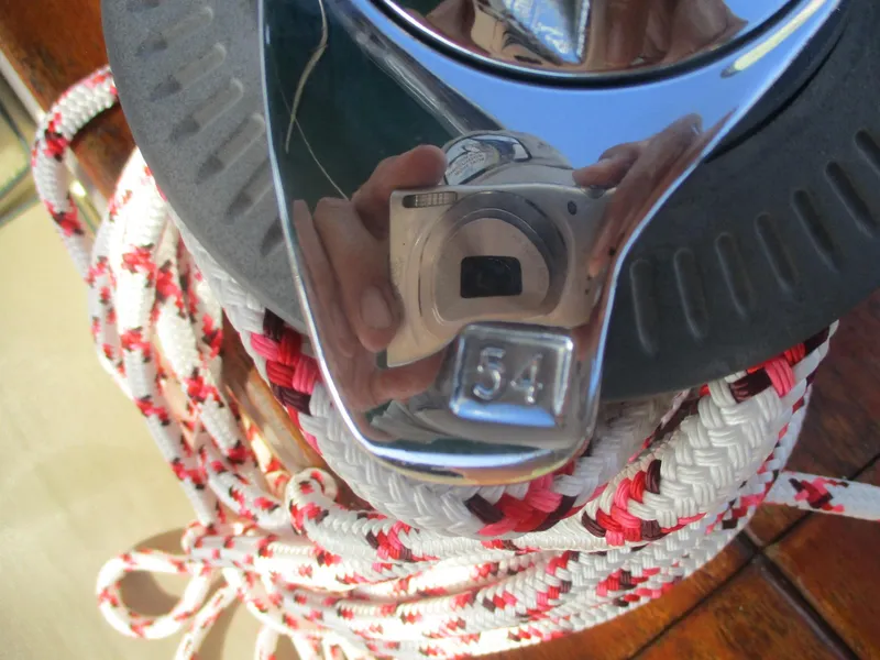 Slide: The Image of Close-up of a winch and ropes on a 1999 Island Packet 380 sailboat. - 16