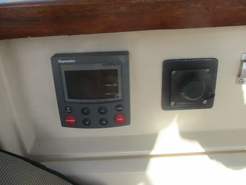 Slide: The Image of Raymarine autopilot control panel on 1999 Island Packet 380 sailboat. - 23