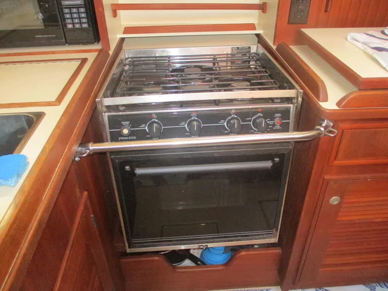 Slide: The Image of Stove and oven in 1999 Island Packet 380 yacht kitchen. - 31
