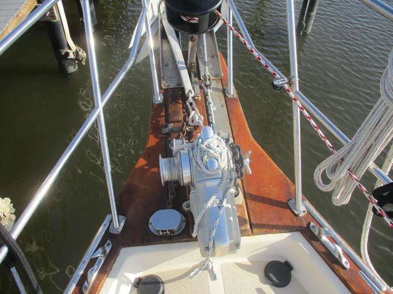 Slide: The Image of Bow of 1999 Island Packet 380 sailboat with anchor and winch system. - 5