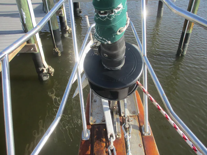 Slide: The Image of Bow of 1999 Island Packet 380 sailboat with anchor and railing. - 6