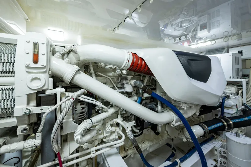 Slide: The Image of Engine room of 2004 Viking Express Sport Fish boat, showcasing complex machinery and components. - 45