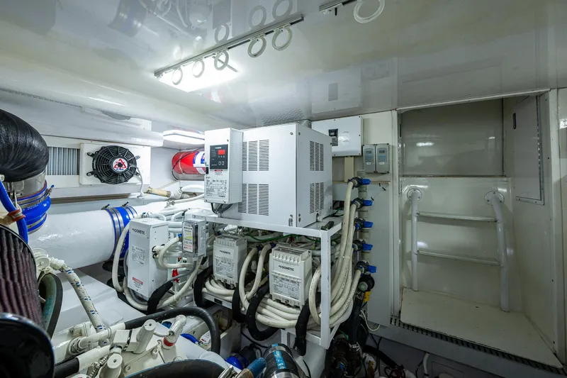 Slide: The Image of Engine room of 2004 Viking Express Sport Fish boat with electrical systems and equipment. - 47