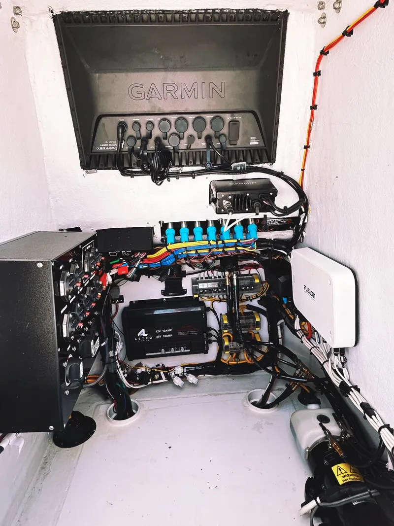 Slide: The Image of 2024 Latitude Tournament Boats LTB 25 electrical system with Garmin equipment and wiring. - 7