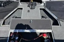 Slide: The Image of 2023 Smoker Craft Excursion 176 DC boat interior with storage compartments and equipment. - 20