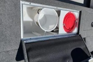 Slide: The Image of 2023 Smoker Craft Excursion 176 DC storage compartment with red and white interior features. - 22