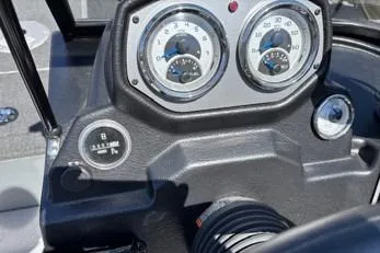 Slide: The Image of Dashboard of 2023 Smoker Craft Excursion 176 DC boat with gauges and controls. - 3