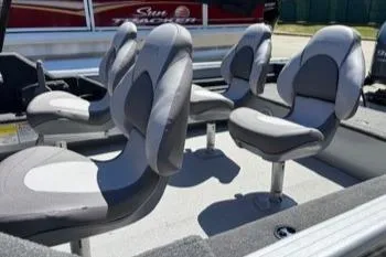 Slide: The Image of 2023 Smoker Craft Excursion 176 DC boat seats, featuring four cushioned swivel chairs. - 7
