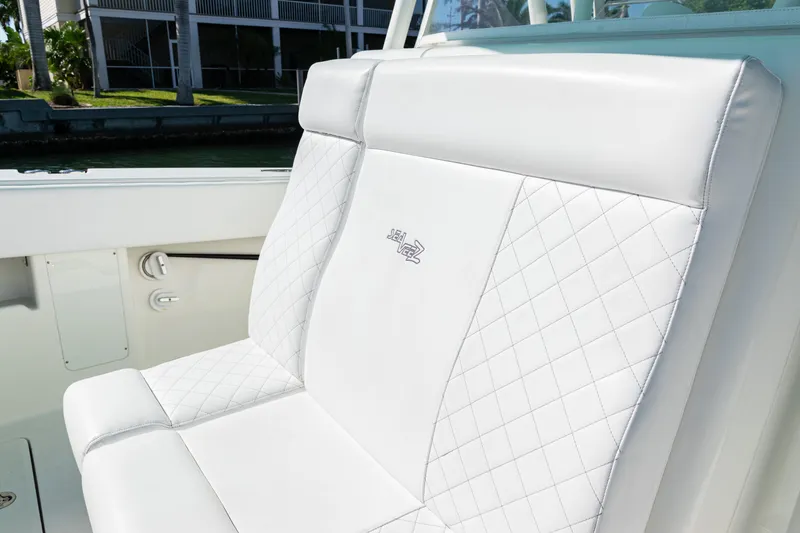 Slide: The Image of White leather seating on 2015 SeaVee 390Z boat with quilted design. - 20